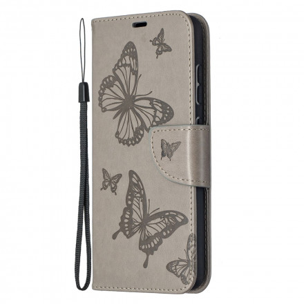 Funda Samsung Galaxy A52 4G / A52 5G Mariposas en vuelo con colgante