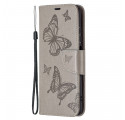 Funda Xiaomi Redmi Note 10/10S/Poco M5s con colgante

 estampada de mariposas