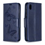Funda Huawei P30 con mariposas y solapa oblicua
