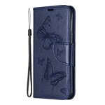 Funda Huawei P30 con mariposas y solapa oblicua