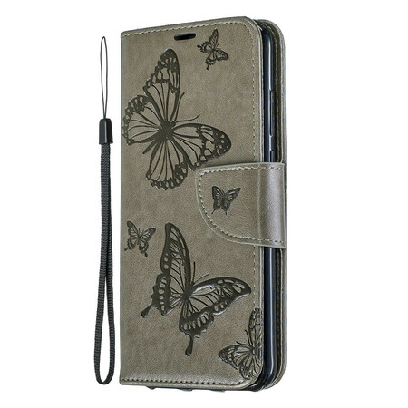 Funda Huawei Y6 2019 Mariposas y solapa oblicua