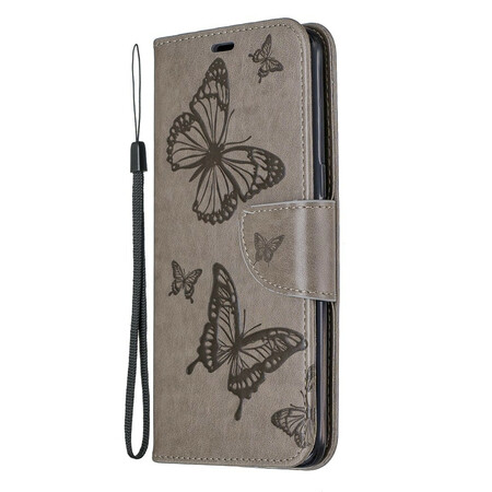 Funda Samsung Galaxy A10s Las mariposas en vuelo con colgante