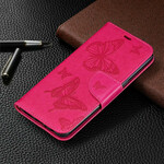 Funda Samsung Galaxy A10s Las mariposas en vuelo con colgante