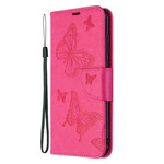 Funda Samsung Galaxy M11 Mariposas en vuelo con colgante