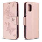 Funda Samsung Galaxy A31 Mariposas en vuelo con colgante