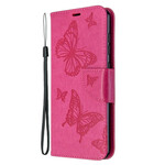 Funda Samsung Galaxy A31 Mariposas en vuelo con colgante