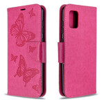 Funda Samsung Galaxy A31 Mariposas en vuelo con colgante